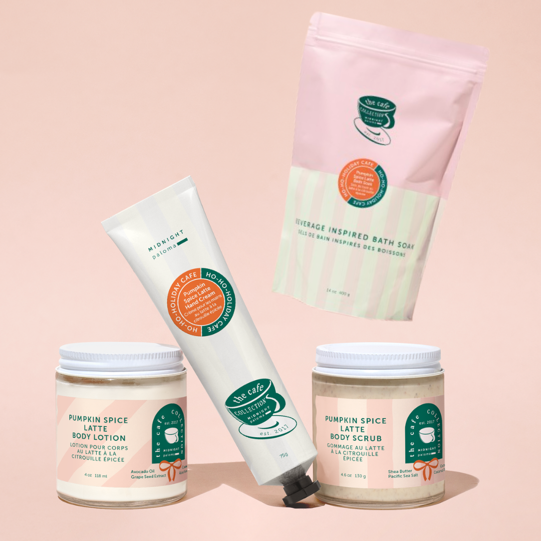 Collection of pumpkin spice latte-themed skincare products on a pink background